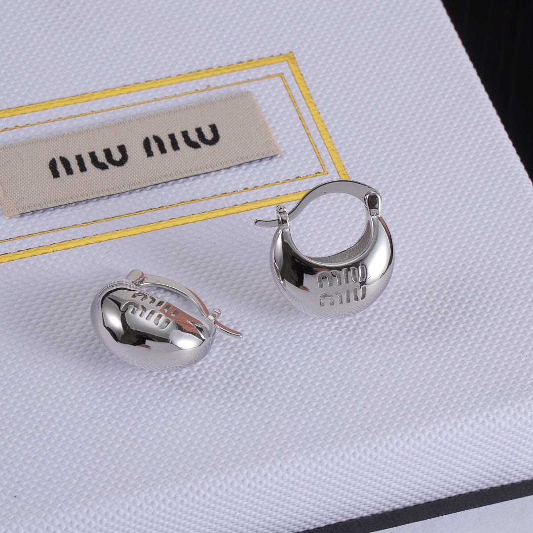 Miu Miu white gold logo hoop earrings with polished curved face and clasp