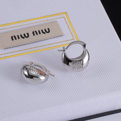 Miu Miu white gold logo hoop earrings with polished curved face and clasp