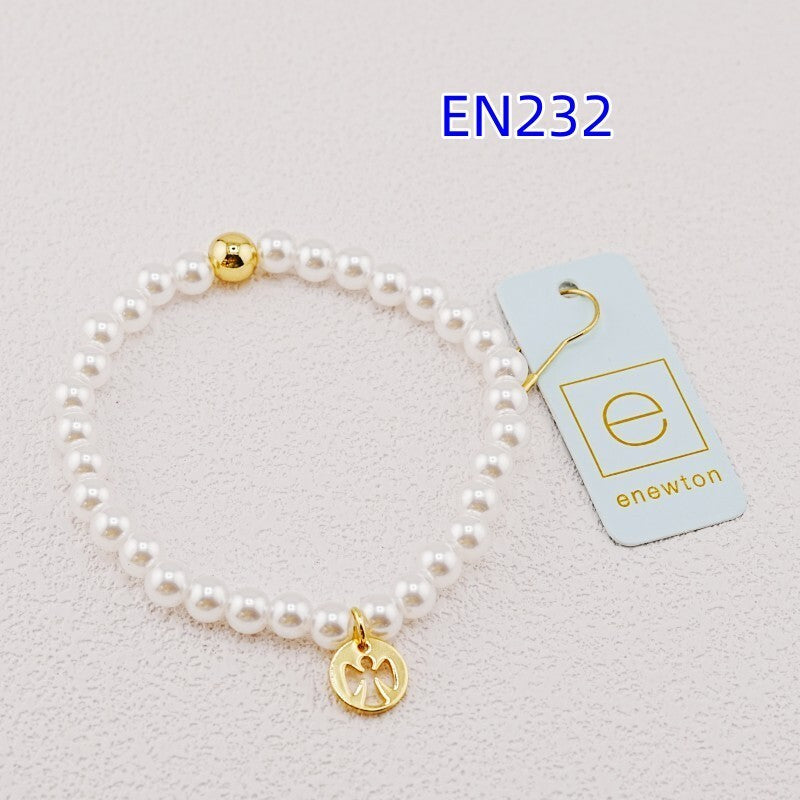 White pearl bead bracelet with gold accent bead and gold paw-print charm