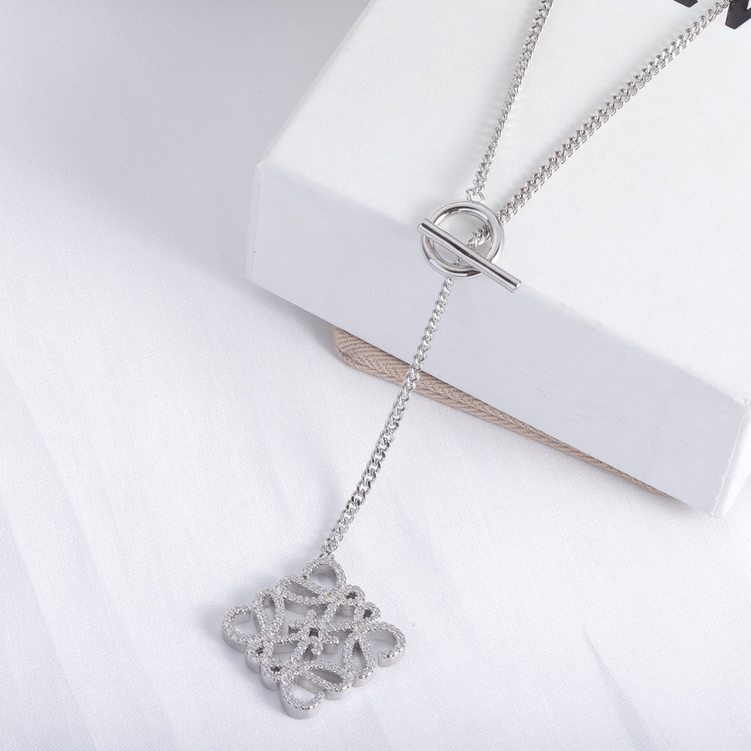 Silver square cutout logo pendant necklace with chain and clasp, pendant centered