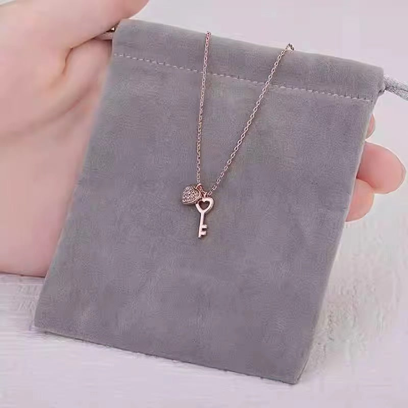 silver diamond heart with key necklace for women