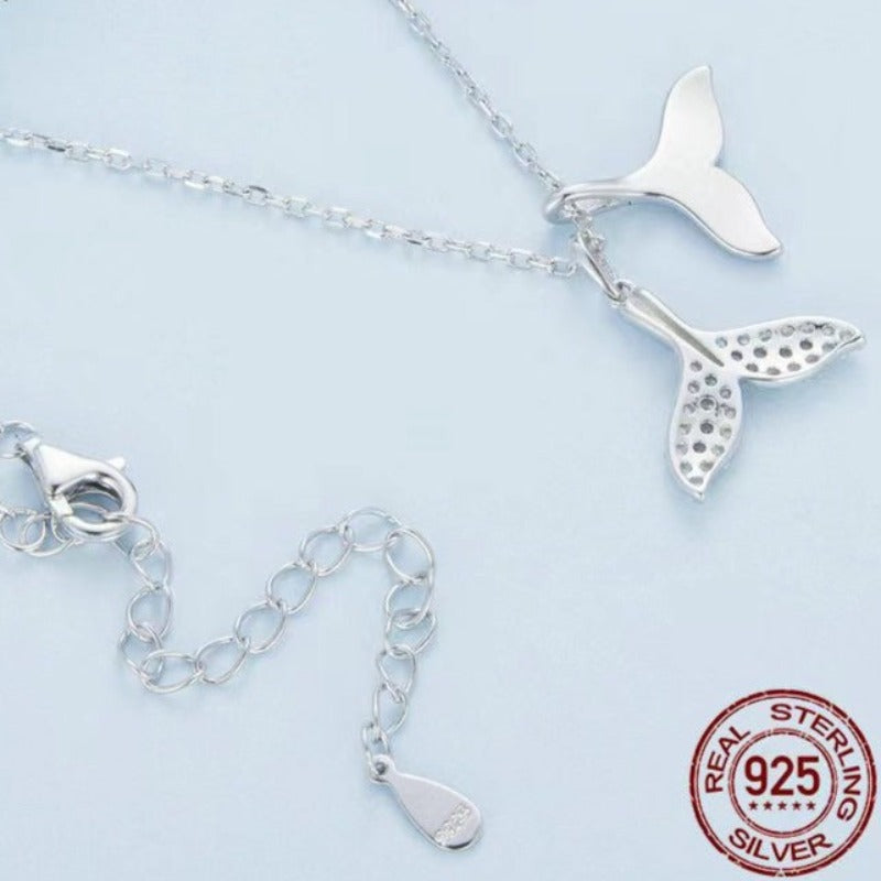 white gold whale tail pendant