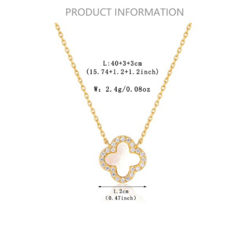 Gold-tone four-leaf clover pendant necklace with clear stones and black onyx center