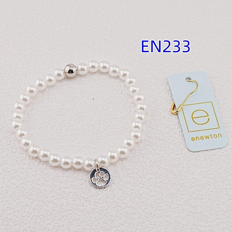 Enewton pearl strand bracelet with silver paw pendant charm and white pearl beads