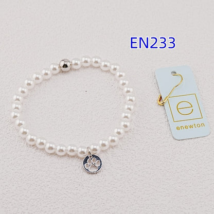 Enewton pearl strand bracelet with silver paw pendant charm and white pearl beads