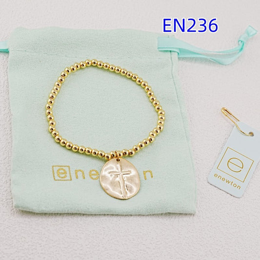 Gold-tone beaded oval cross pendant bracelet with round cross charm