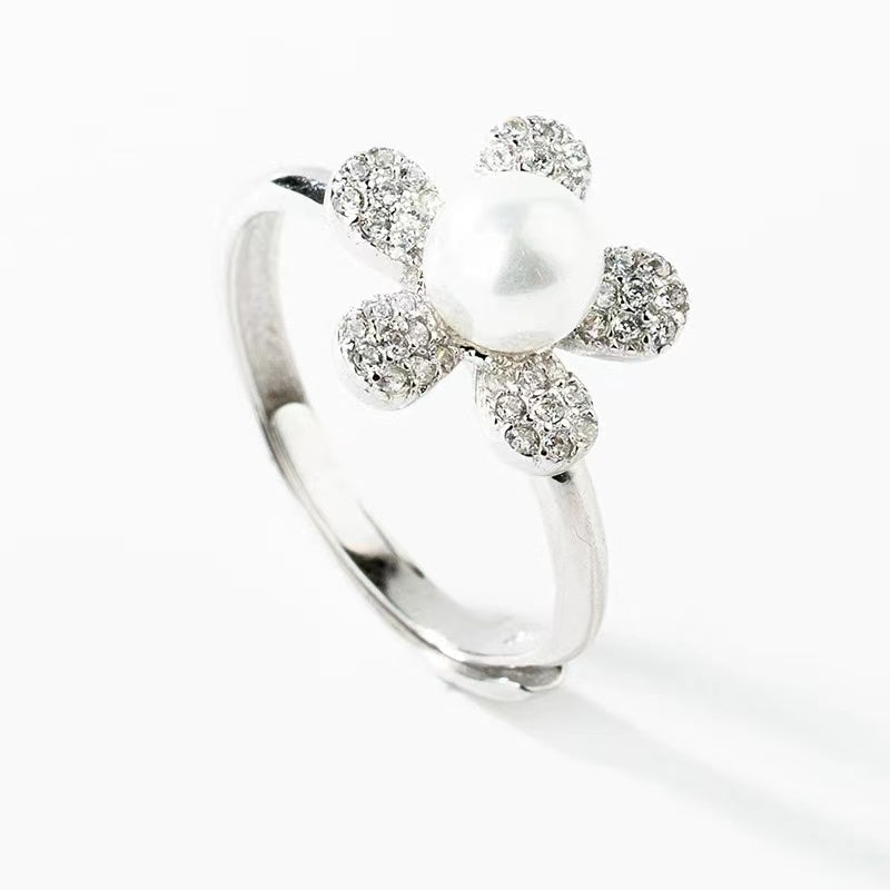 women`s diamond flower with pearl ring