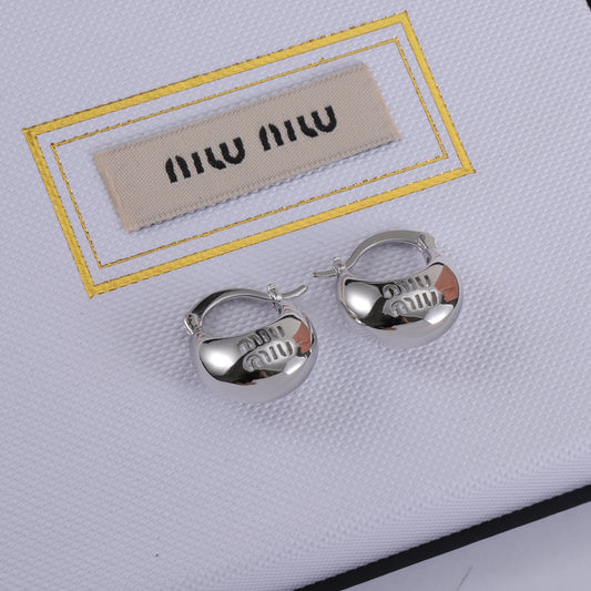 White gold hoop earrings with 'miu miu' logo front