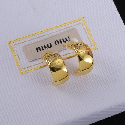 Miu Miu gold glossy C-shaped hoop earrings with logo pavé detail