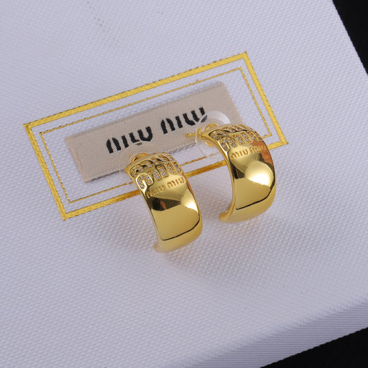 Miu Miu gold glossy C-shaped hoop earrings with logo pavé detail