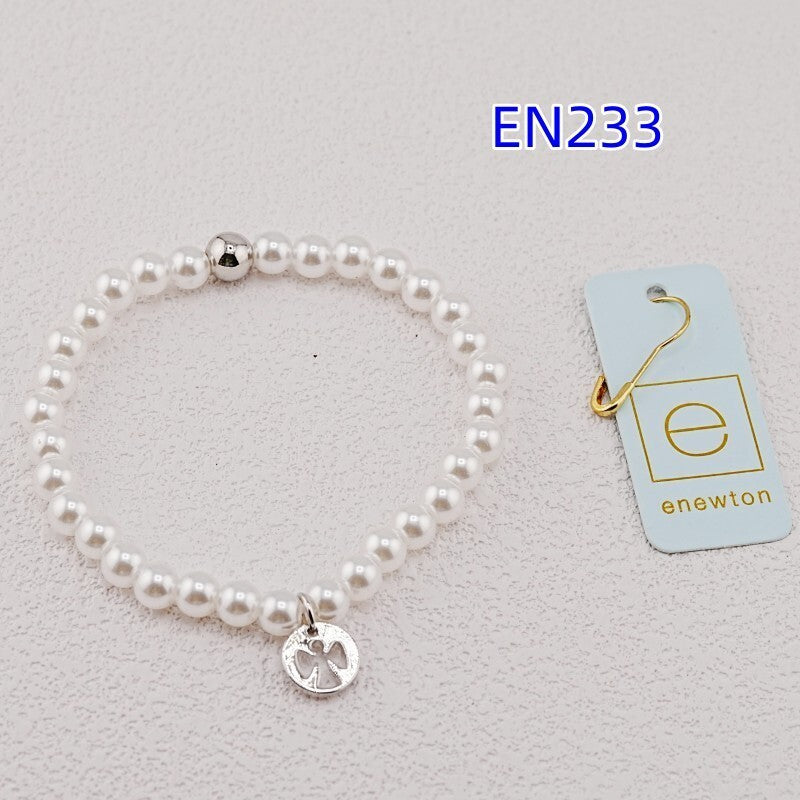 Pearl strand bracelet with silver paw pendant charm and white pearl beads
