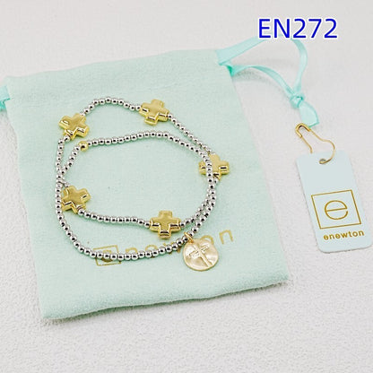 2-beaded bracelet set with gold cross charms, silver beaded chains, round coin pendant.