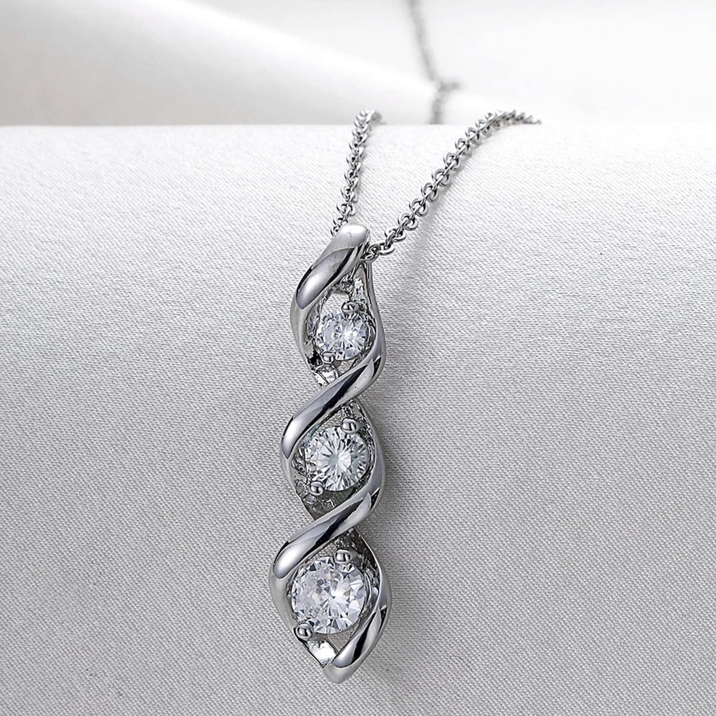 Three-Stone Swirl Pendant Necklace