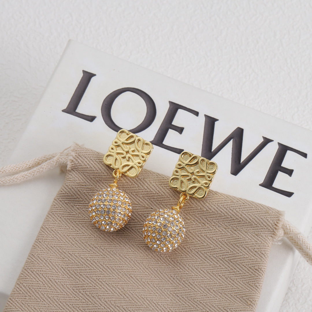 Gold square-logo stud earrings with dangling round crystal pavé balls