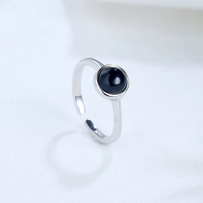 women`s round black onyx ring