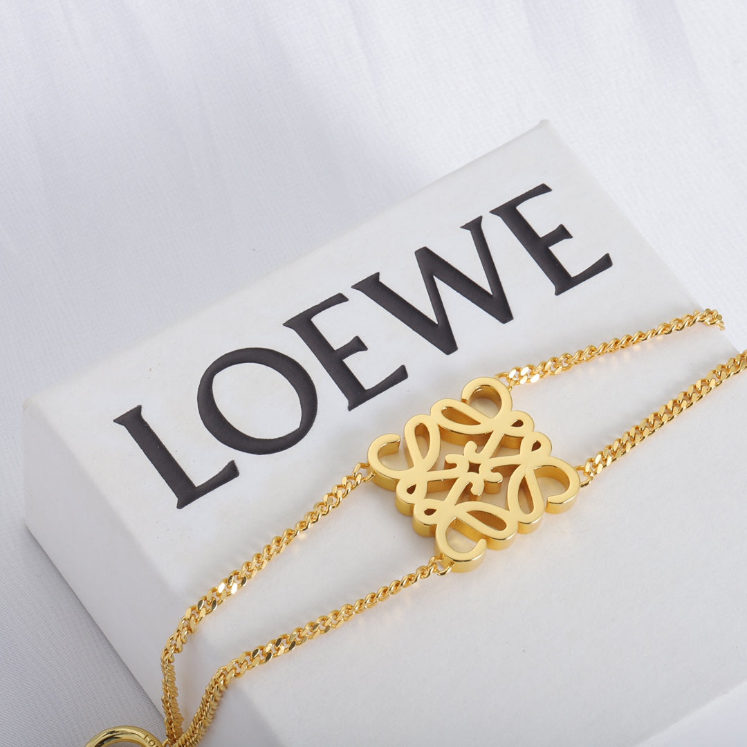 Gold LOEWE logo pendant bracelet with square cutout openwork charm