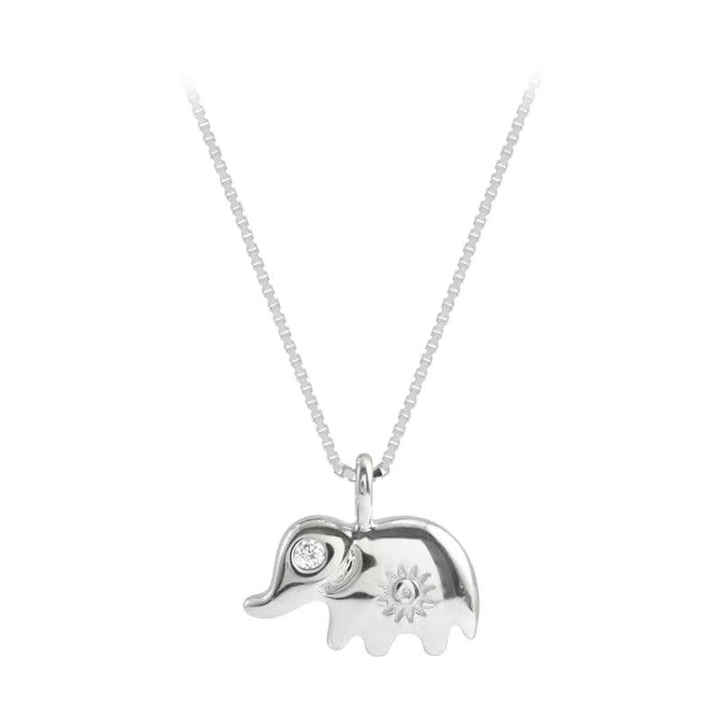 	 white and gold elephant pendant necklace