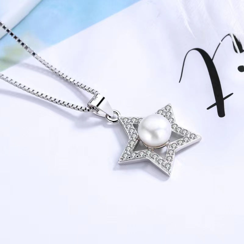 women`s star necklace