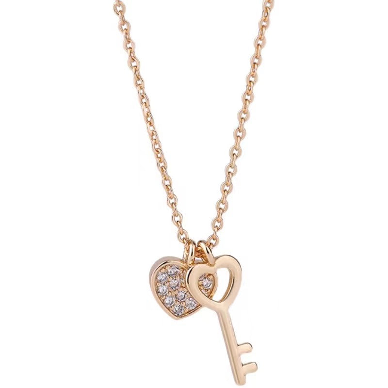 silver diamond heart with key necklace
