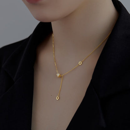 Glamorous Silver Long Drop Necklace with Roman Numeral Details

