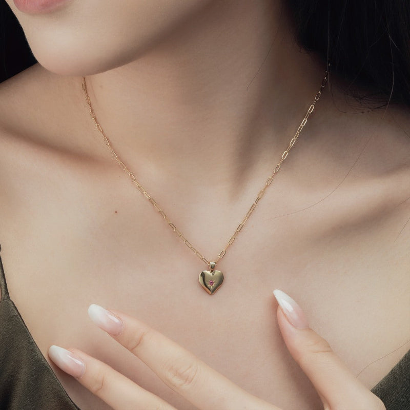 Modern Heart Necklace with Starburst Detail

