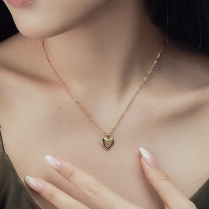 Modern Heart Necklace with Starburst Detail

