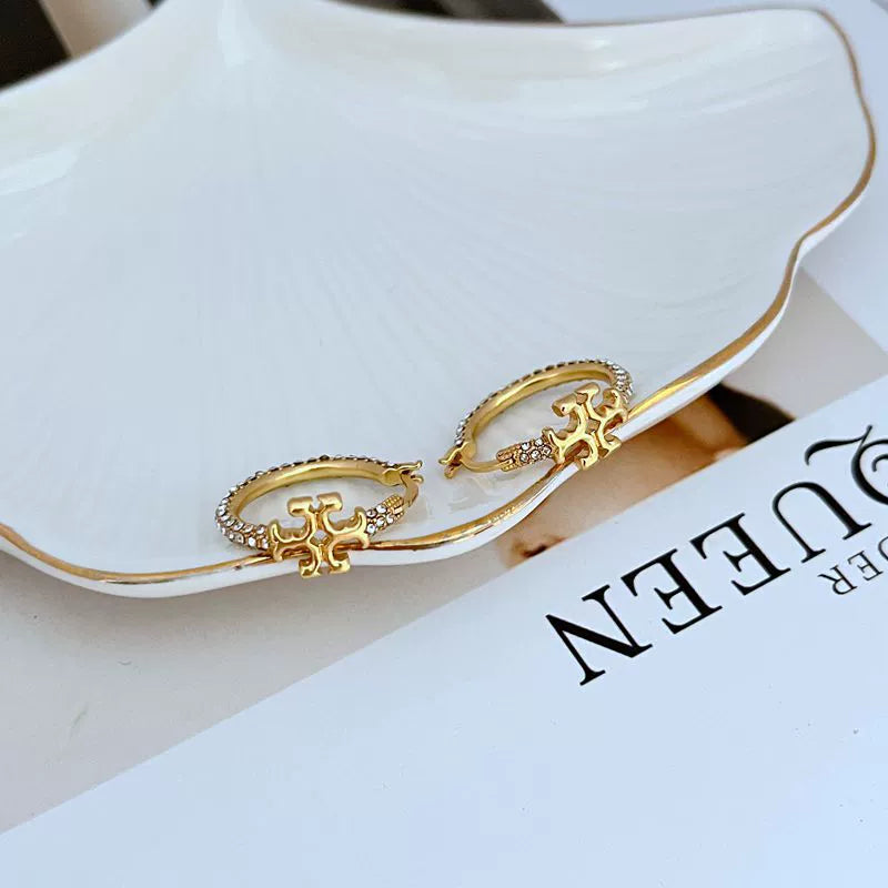 Miniature Double T Logo Huggie Earrings

