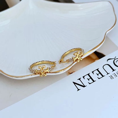 Miniature Double T Logo Huggie Earrings

