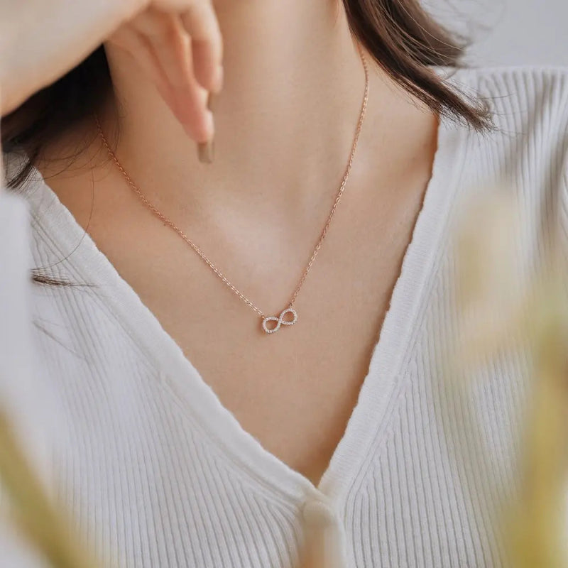 Crystal-Encrusted Infinity Charm

