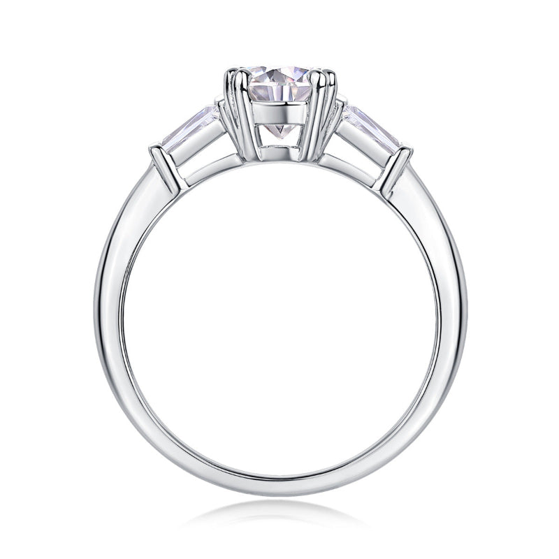 Prong Set Moissanite with Channel Set CZ Baguettes

