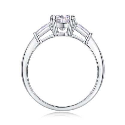 Prong Set Moissanite with Channel Set CZ Baguettes

