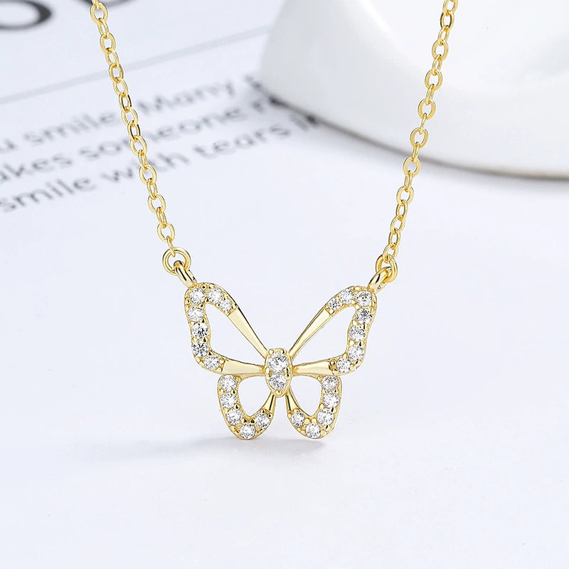 Silver Butterfly Necklace (assuming the metal color)

