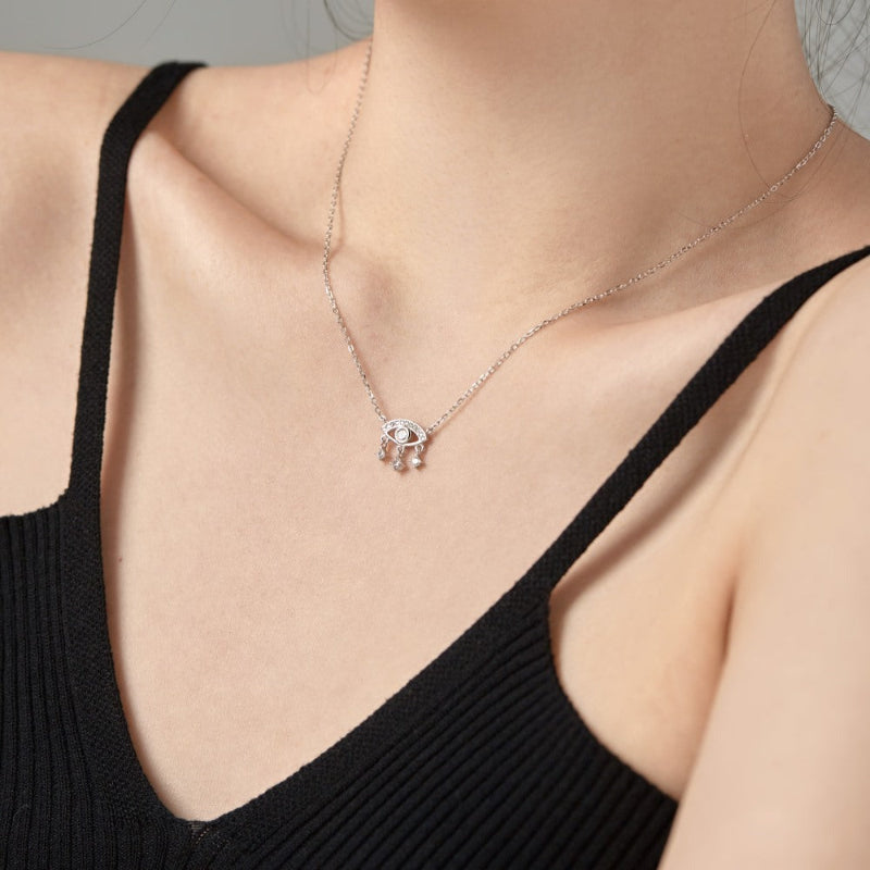 Shimmering Eye with Dangling Crystals

