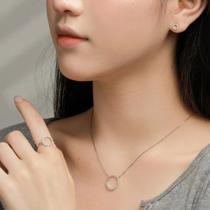 Glossy Silver Heart Necklace with a Single Gem


