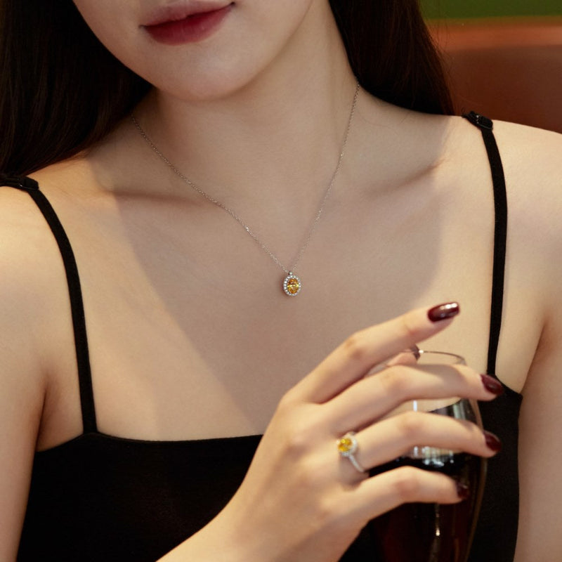 Minimalist Silver Oval Golden Yellow Stone with Diamond-like Border

