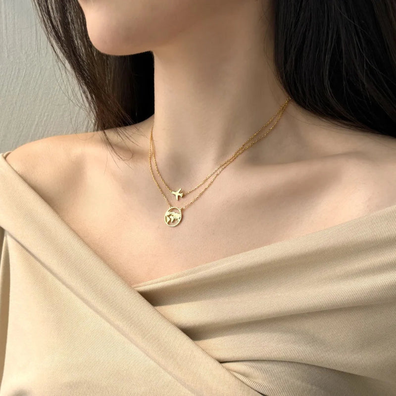 Silver Plane & Earth Map Necklace

