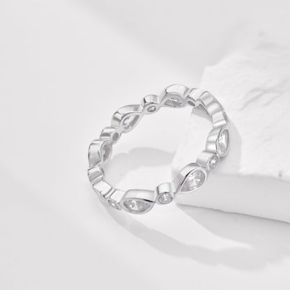 Bezel Set Pear and Round Gold Band


