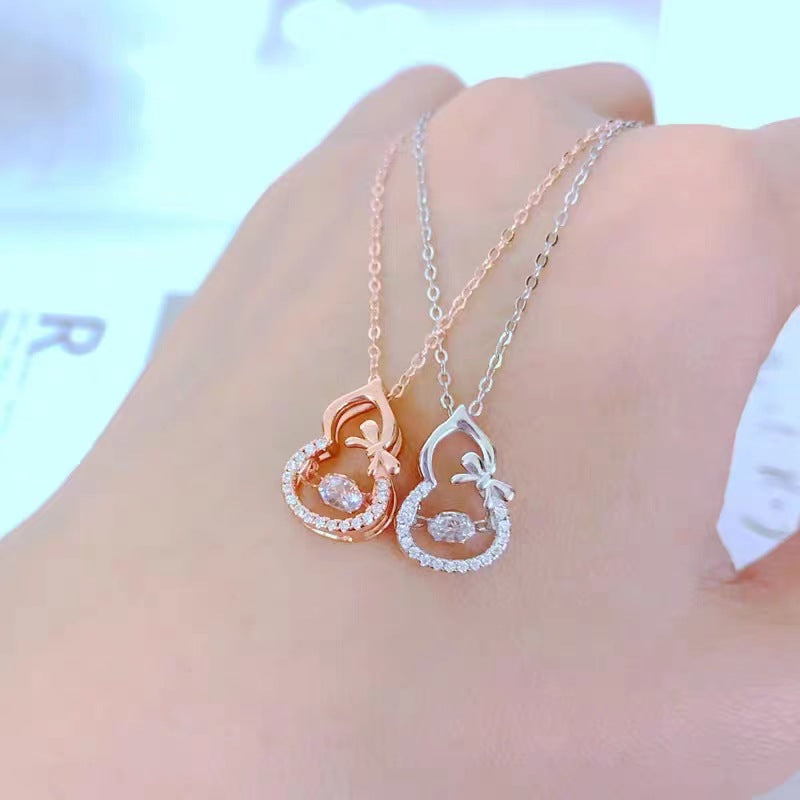 Butterfly Gourd Dancing Stone Necklace (referencing the small bow/butterfly element)


