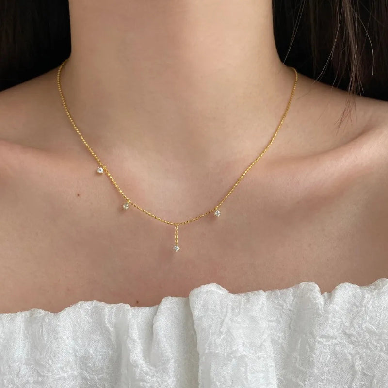 Elegant Gold Lariat with Gemstone

