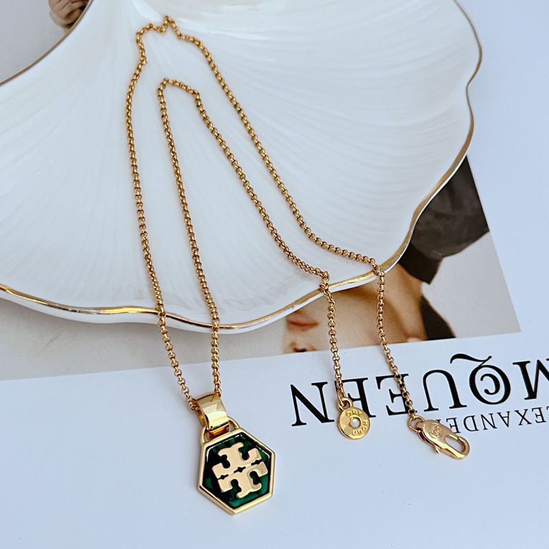Chic Gold-Tone Hexagon Logo Pendant

