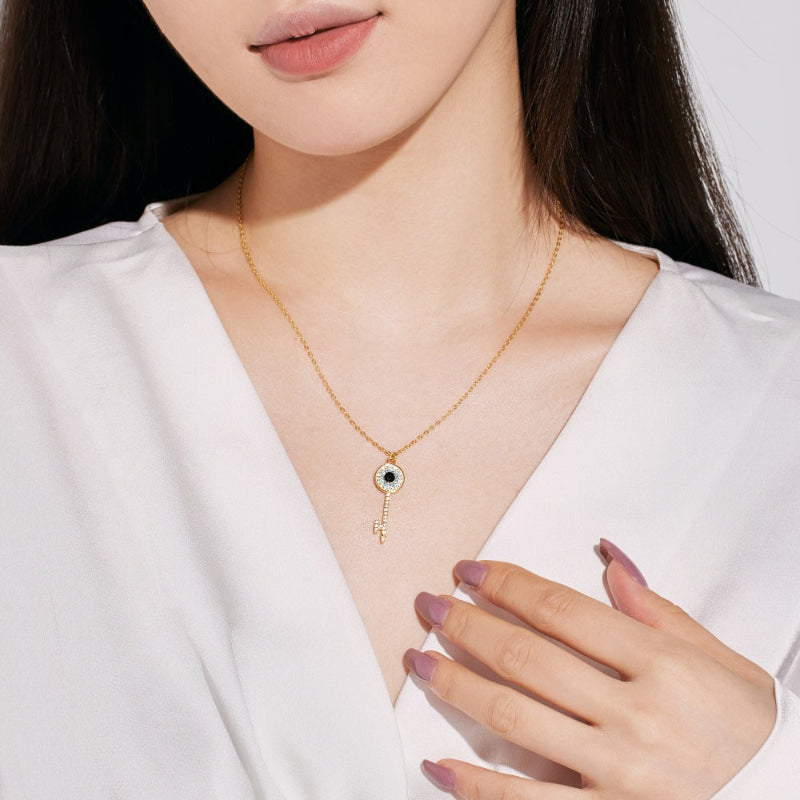 Silver Necklace with a Symbolic Key and Eye

