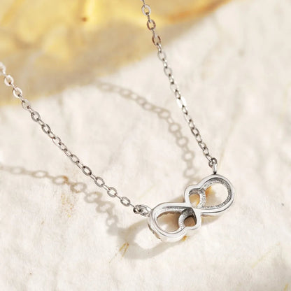 Delicate Silver "8" Pendant