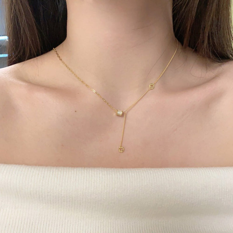Chic Silver Lariat with Interlocking Chains and Engraved Rings

