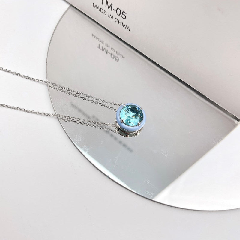 Eye-Catching Crystal Solitaire with Light Blue Enamel

