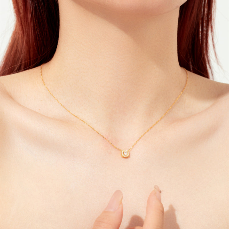 Radiant Solitaire with Pave Surround

