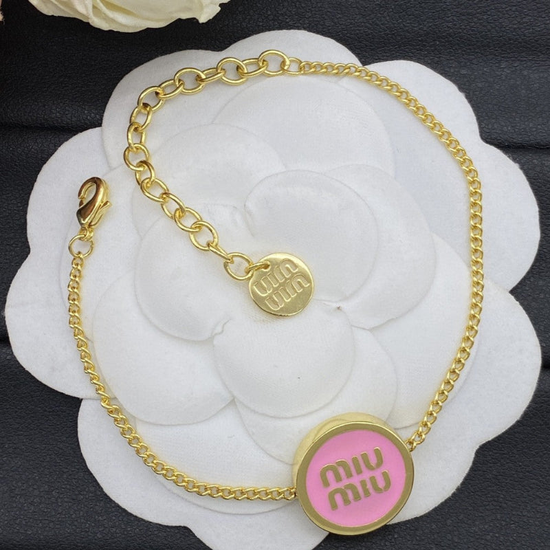 Miu Miu Gilt Chain Bracelet Set with Round Charms

