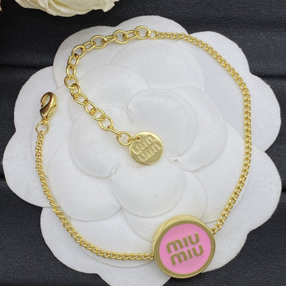 Miu Miu Gilt Chain Bracelet Set with Round Charms

