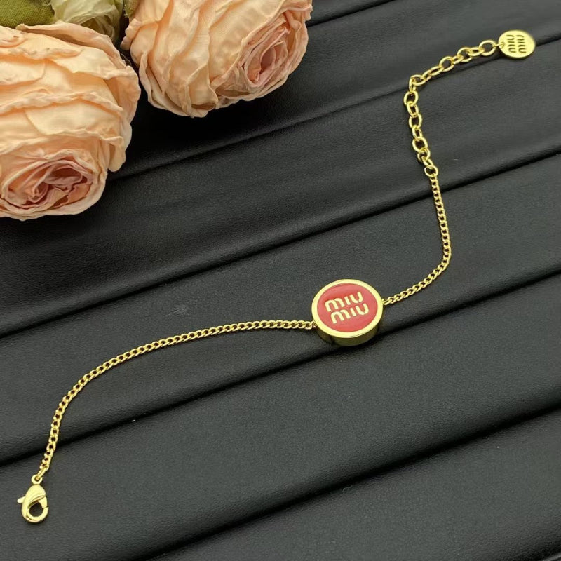 Miu Miu Gold Chain with Red Pendant

