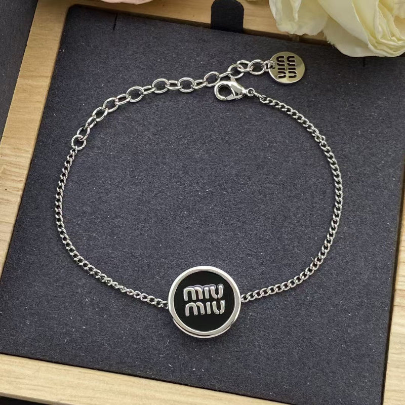 Miu Miu Enamel Disc Necklace, Bracelet, and Earring Set

