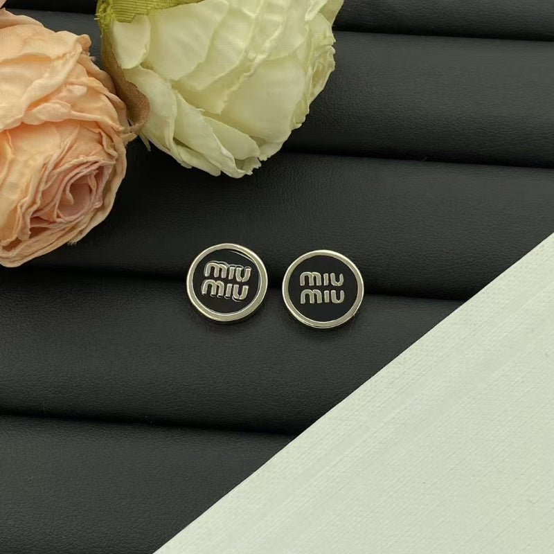 Miu Miu Black and Silver Enamel Jewelry Collection


